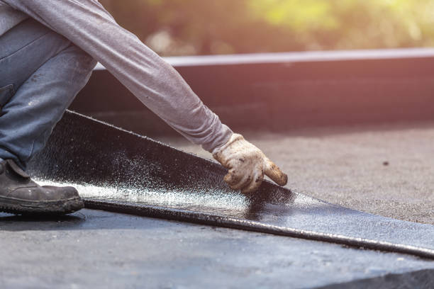 Professional Waterproofing technician working in Warrenton, VA